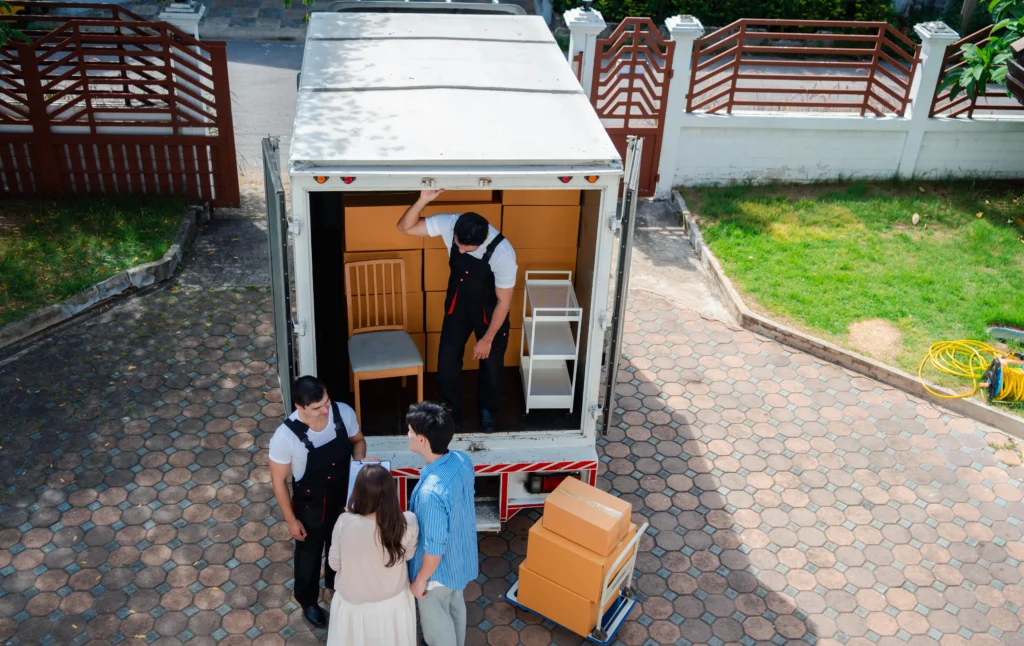 Current image: Edmonton movers loading furniture into a moving truck