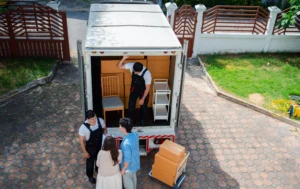 Edmonton movers loading furniture into a moving truck