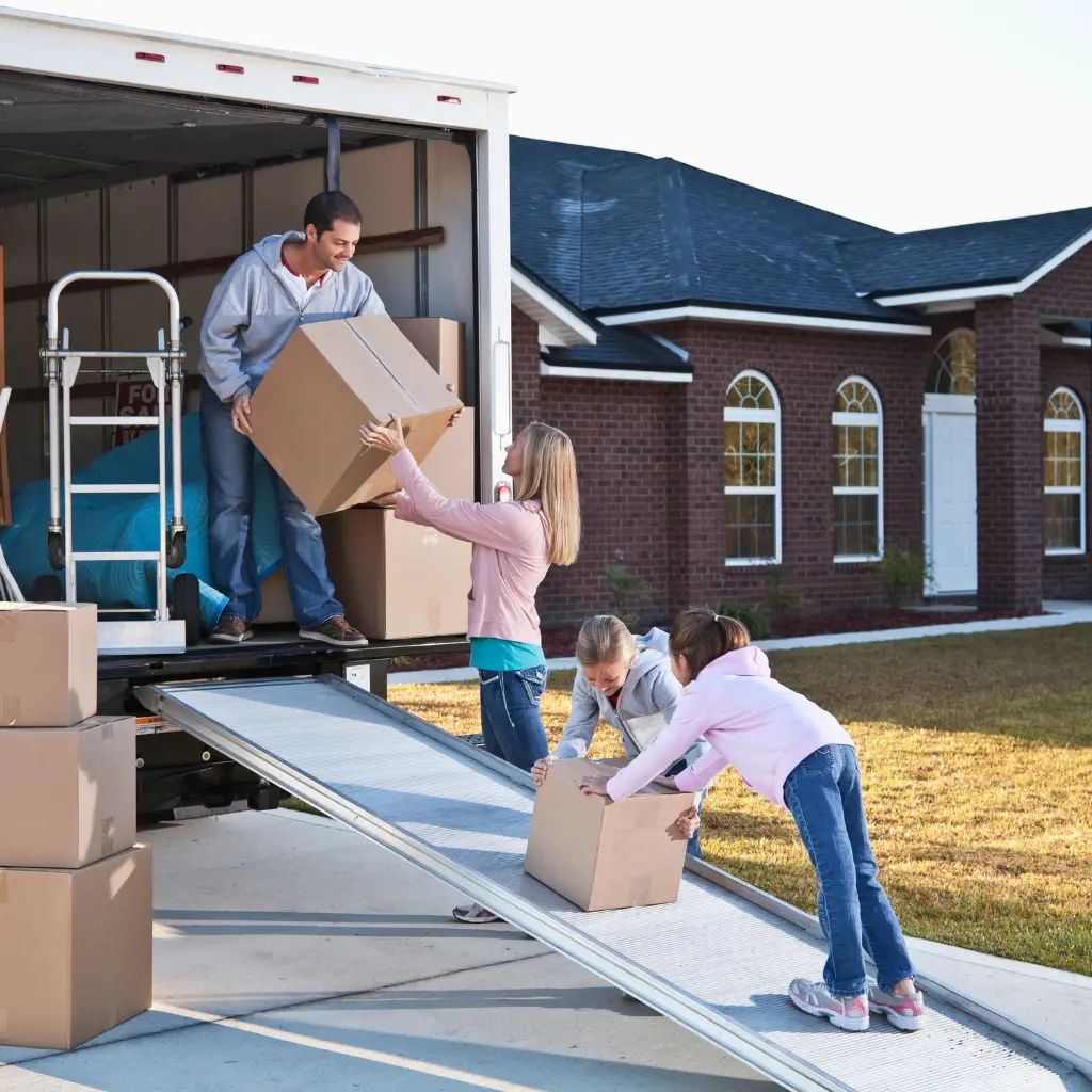 movers loading a few boxes into a moving truck in Edmonton