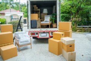 Moving crew removing unwanted furniture before a residential move
